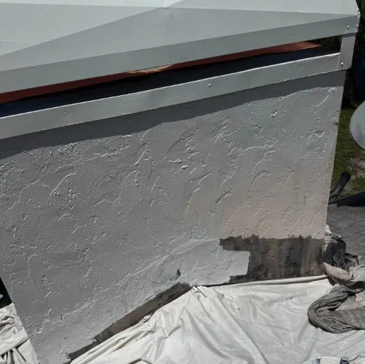 South Florida stucco exterior wall being prepared before finish painting