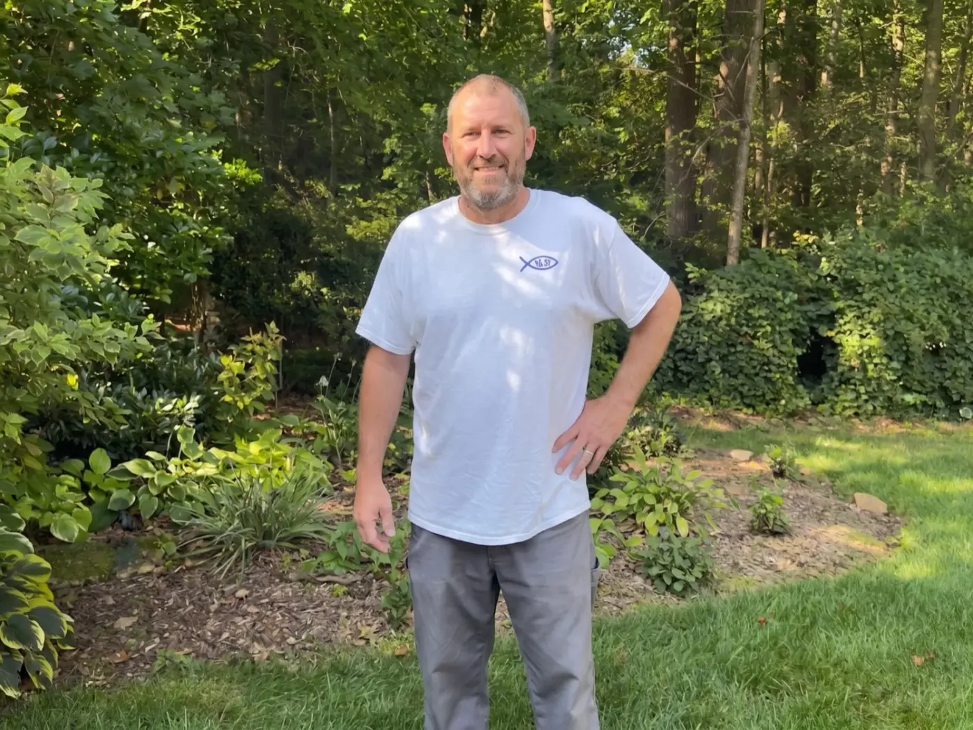 Kevin Jasper standing outdoors in a Prodigal Son Painting shirt